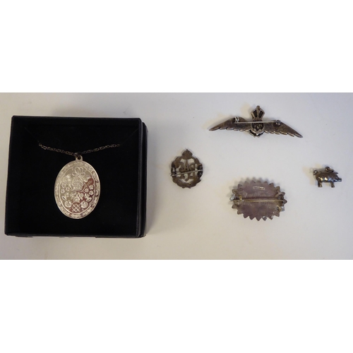 68 - Jewellery: to include a white metal RAF badge with enamelled decoration