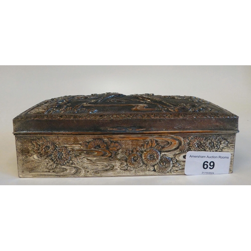 69 - A silver plated jewellery box, decorated in relief with flowers and birds  7.25