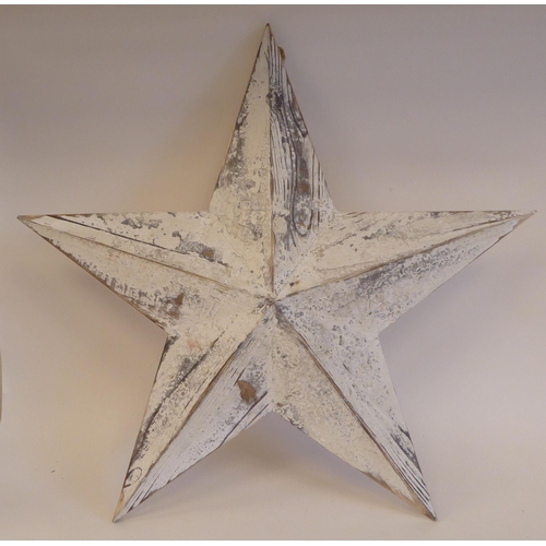 78 - A pair of white painted wooden barn stars  each 21