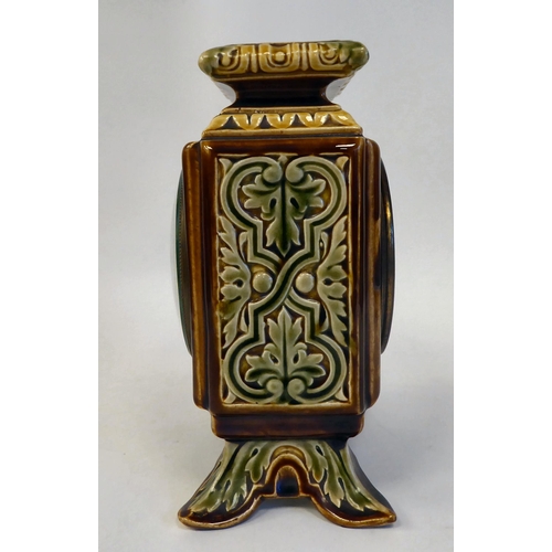 89 - An early 20thC Continental foliate moulded china, square cased mantel timepiece; faced by a brass an... 