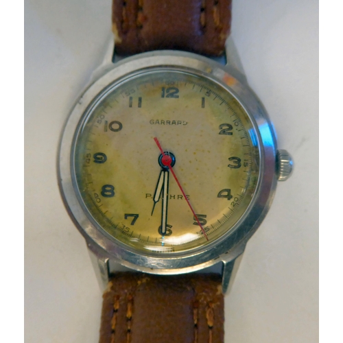 92 - A vintage Paul Buhre stainless steel cased wristwatch from Garrard & Co, with a second hand, fac... 