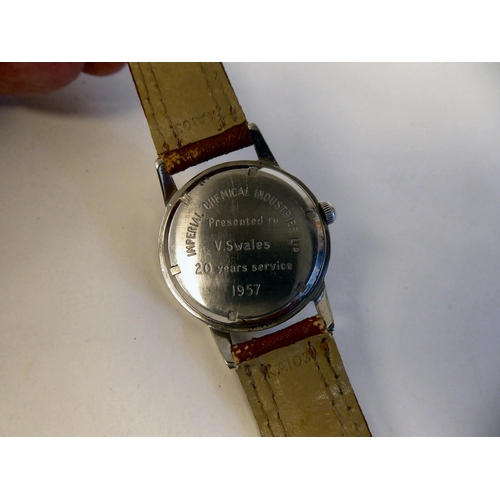 92 - A vintage Paul Buhre stainless steel cased wristwatch from Garrard & Co, with a second hand, fac... 