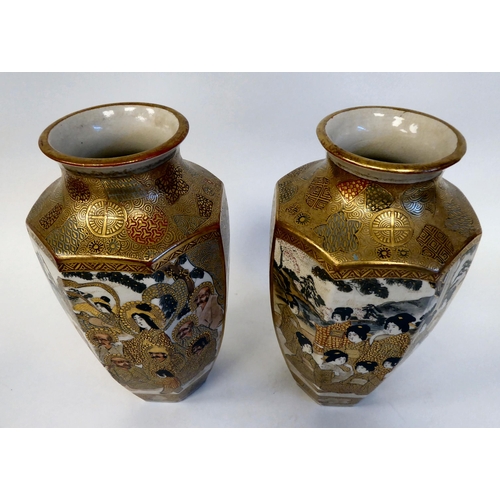 96 - A pair of modern Kutani porcelain octagonal baluster vases, decorated in gilding with multiple portr... 