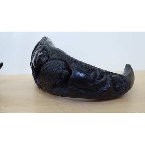 265 - A pair of carved and hollowed buffalo horns  15