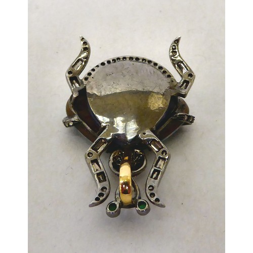 149 - An antique bi-coloured metal beetle pendant, variously set with opals and diamonds