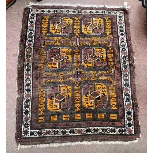 345 - A North African woven woollen rug, decorated in geometric forms, on a multi-coloured ground  51