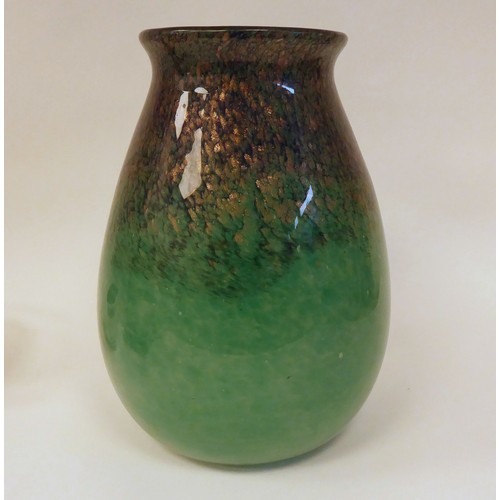 48 - A Moncrieff Monart glass vase of tapered, bulbous form with a flared rim, decorated in opaque green ... 