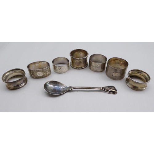 1 - Silver items, viz. seven dissimilar napkin rings; and a presentation spoon  mixed marks