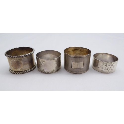 1 - Silver items, viz. seven dissimilar napkin rings; and a presentation spoon  mixed marks