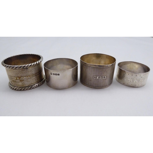 1 - Silver items, viz. seven dissimilar napkin rings; and a presentation spoon  mixed marks