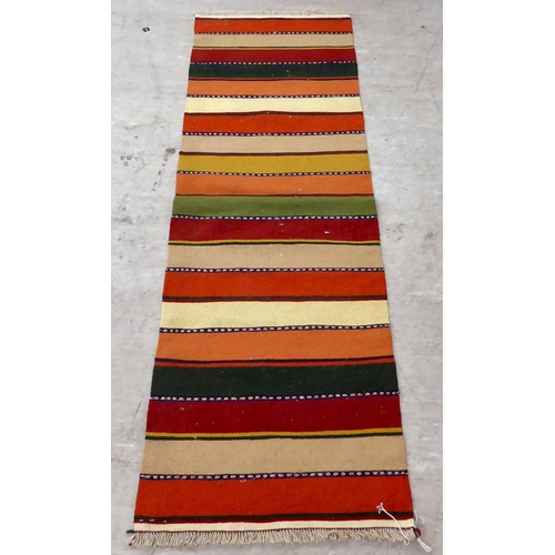 101 - A Kelim design runner, decorated with multi-coloured bands  80