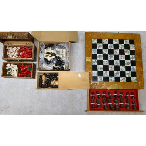 119 - Chess sets: to include a possibly Staunton cream and red painted wooden example