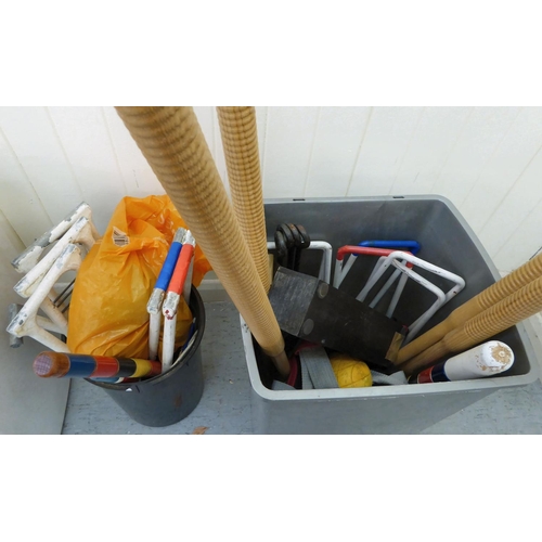 130 - Croquet items, comprising mallets, hoops and balls