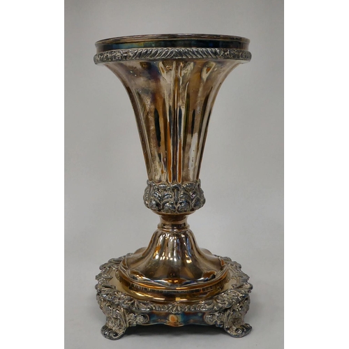 142 - A 20thC silver plated table centrepiece, fashioned as a tapered vase, on a C-scroll and foliage cast... 