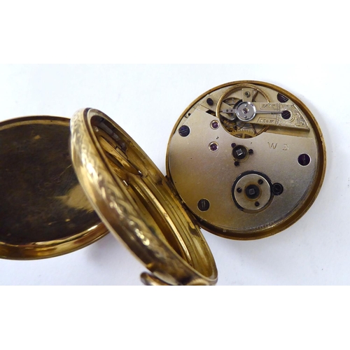 144 - An 18ct gold cased fob watch, faced by a Roman dial