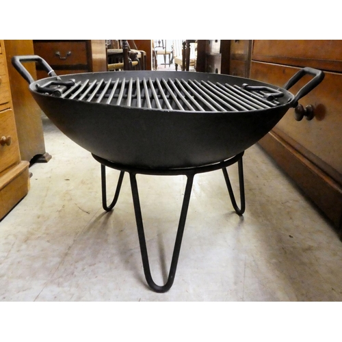 148 - A cast iron combination fire pit/bbq  16