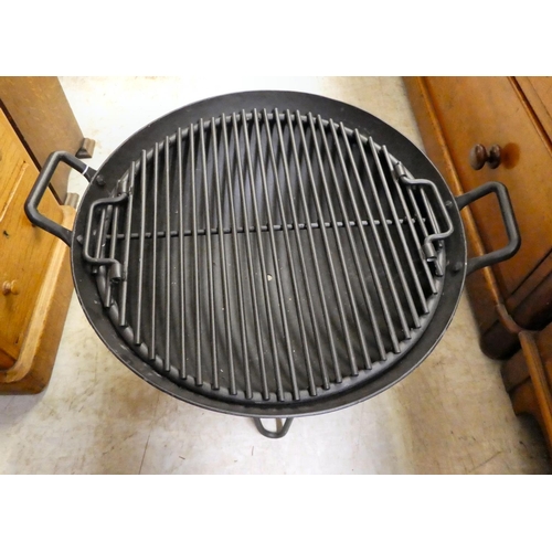 148 - A cast iron combination fire pit/bbq  16