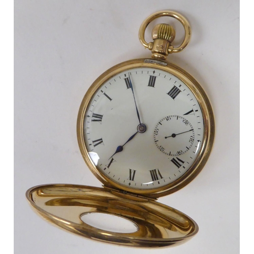 159 - A 9ct gold half-hunter pocket watch, faced by a Roman dial with subsidiary seconds 