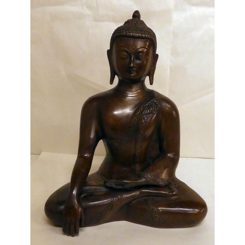 161 - A modern bronze, a seated Buddha  12