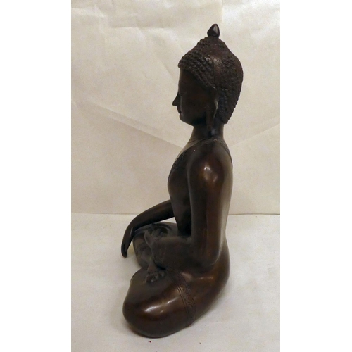 161 - A modern bronze, a seated Buddha  12