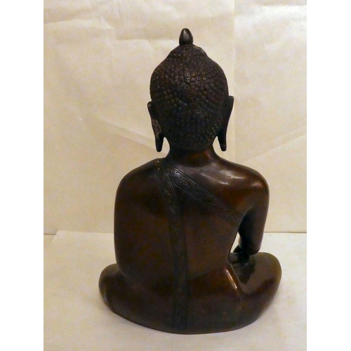 161 - A modern bronze, a seated Buddha  12