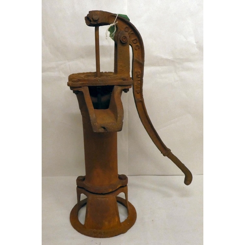 168 - A rust coloured cast iron replica of a 19thC water pump head  21