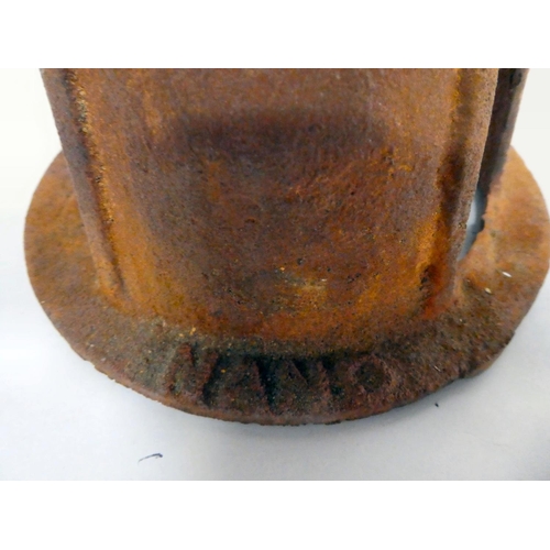 168 - A rust coloured cast iron replica of a 19thC water pump head  21