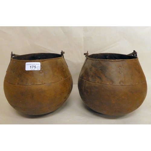 175 - A pair of rivetted cast metal hanging cooking pots  7