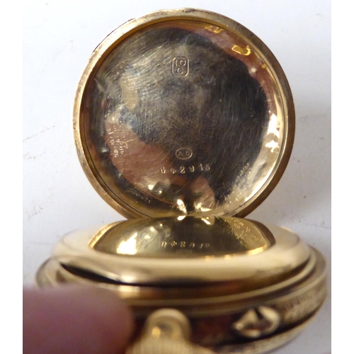 187 - A 10ct gold cased fob watch, faced by a Roman dial with subsidiary seconds