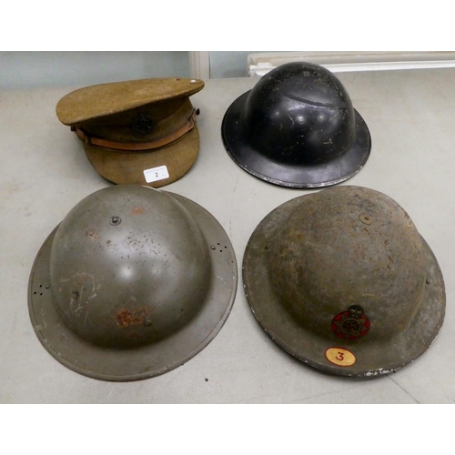 2 - Four helmets: to include one 'National Fire Service', and a fabric peaked cap with a military police... 