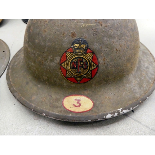 2 - Four helmets: to include one 'National Fire Service', and a fabric peaked cap with a military police... 