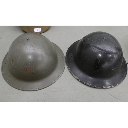 2 - Four helmets: to include one 'National Fire Service', and a fabric peaked cap with a military police... 