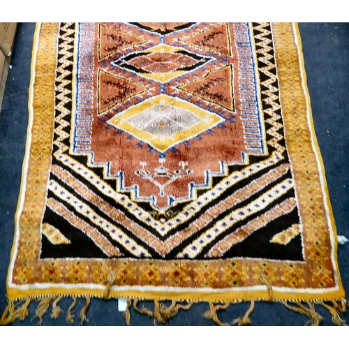 20 - Rugs: to include a Kelim with stylised motifs, on a multi-coloured ground  76