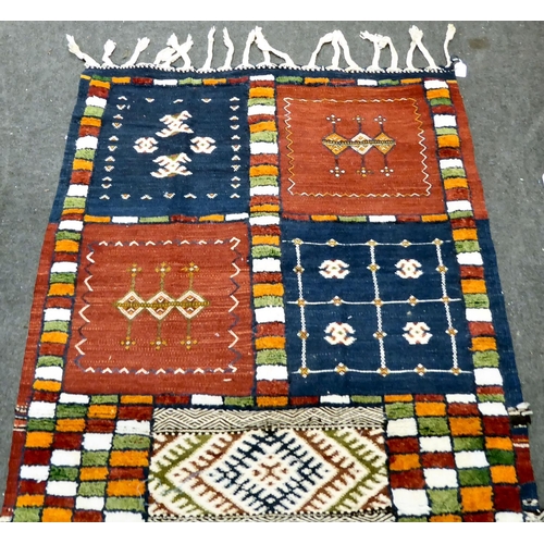 20 - Rugs: to include a Kelim with stylised motifs, on a multi-coloured ground  76