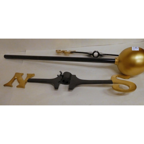 214 - A gold and black painted metal weather vane with ball decoration  30