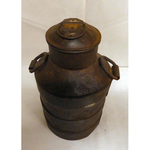 221 - A reproduction cast metal, twin handled milk churn  10