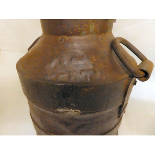 221 - A reproduction cast metal, twin handled milk churn  10