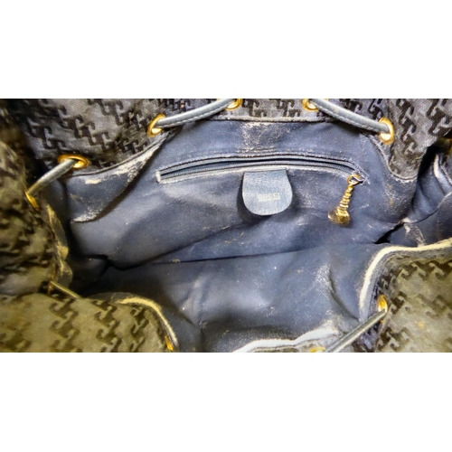 223 - A Gucci blue hide and fabric handbag, serial no.001.115.1366  with dust cover; and a Burberry vanity... 