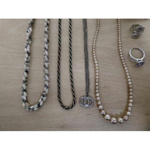 246 - Costume jewellery, mainly brooches and dress rings