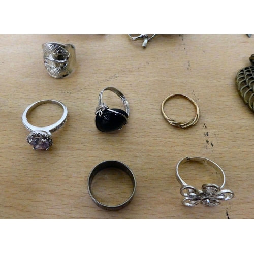 246 - Costume jewellery, mainly brooches and dress rings