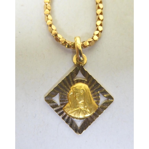 262 - A yellow metal neckchain and pendant  stamped 750