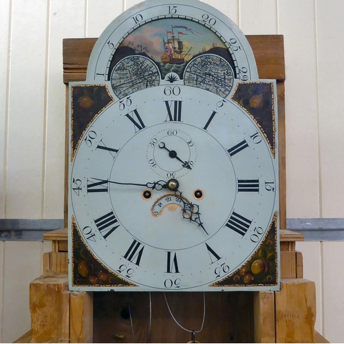 277 - A 19thC and later stripped pine longcase clock with flank pillars, on a box base; the movement with ... 