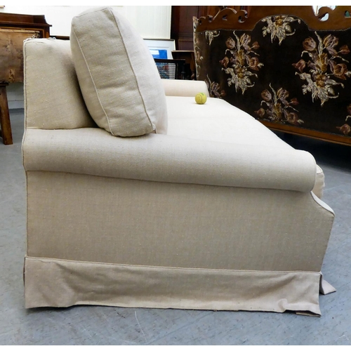 278 - A modern cream coloured, metal frame bed settee with a low back and scrolled arms and loose cushions... 