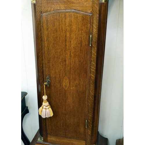 281 - A 19thC oak and mahogany longcase clock with a swan neck pediment and flank pillars, on a marquetry ... 