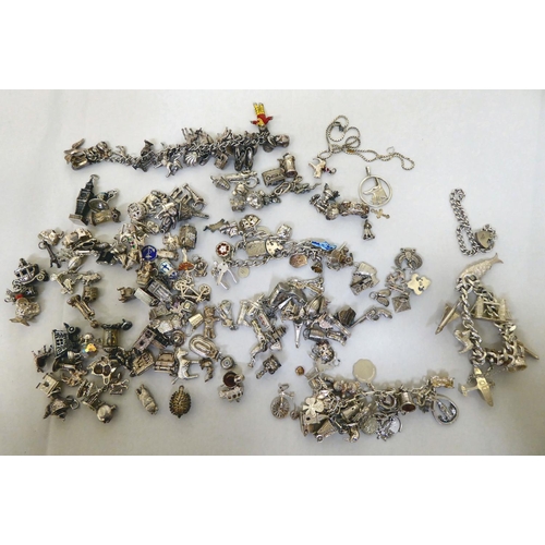 294 - Silver and white metal items of personal ornament: to include pendant charms  mixed marks