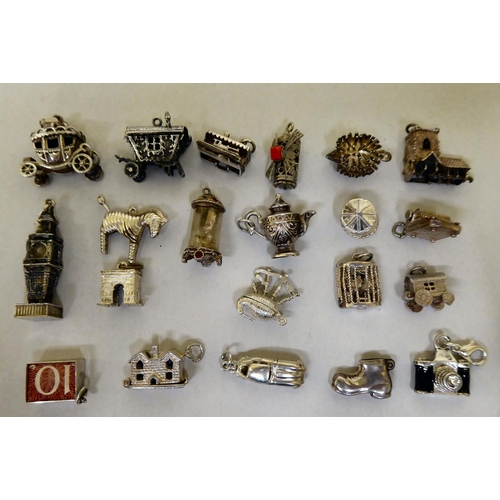 294 - Silver and white metal items of personal ornament: to include pendant charms  mixed marks