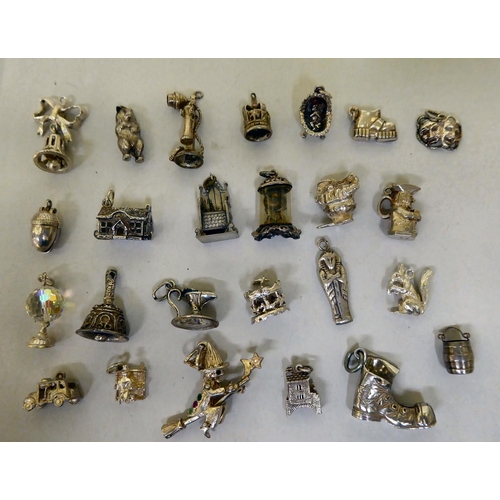 294 - Silver and white metal items of personal ornament: to include pendant charms  mixed marks