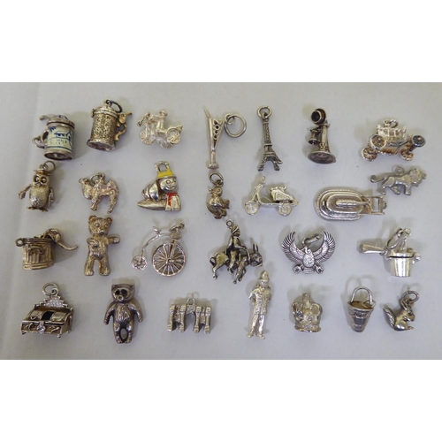 294 - Silver and white metal items of personal ornament: to include pendant charms  mixed marks