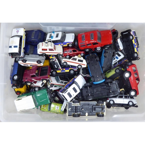 304 - Diecast model vehicles, mainly Police Range Rovers and other Made in China, plastic examples