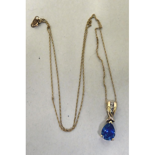 336 - A 9ct gold blue tanzanite and diamond pendant necklace